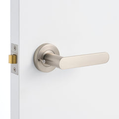 Brushed Nickel Privacy Door Handle Installed on a Door