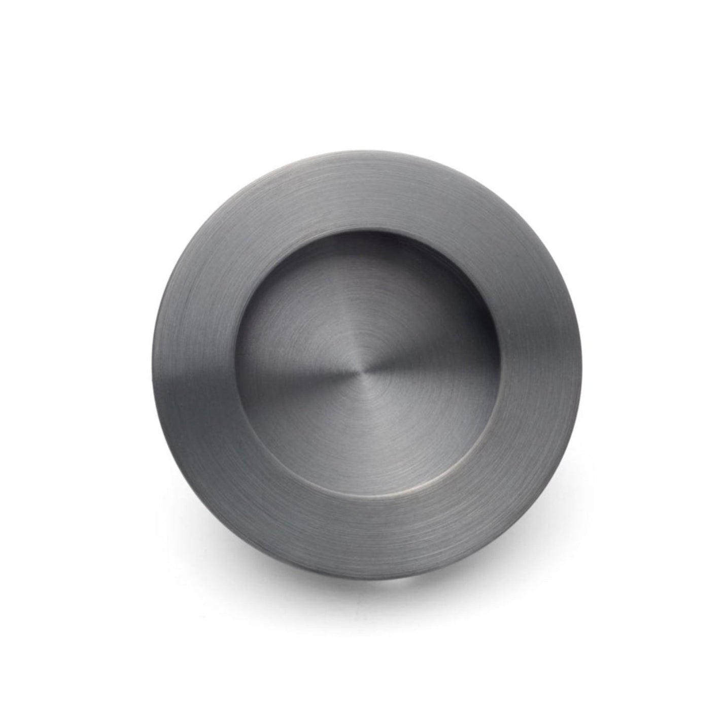 A gunmetal round flush pull for sliding doors with a visible textured surface and a central sunken area.