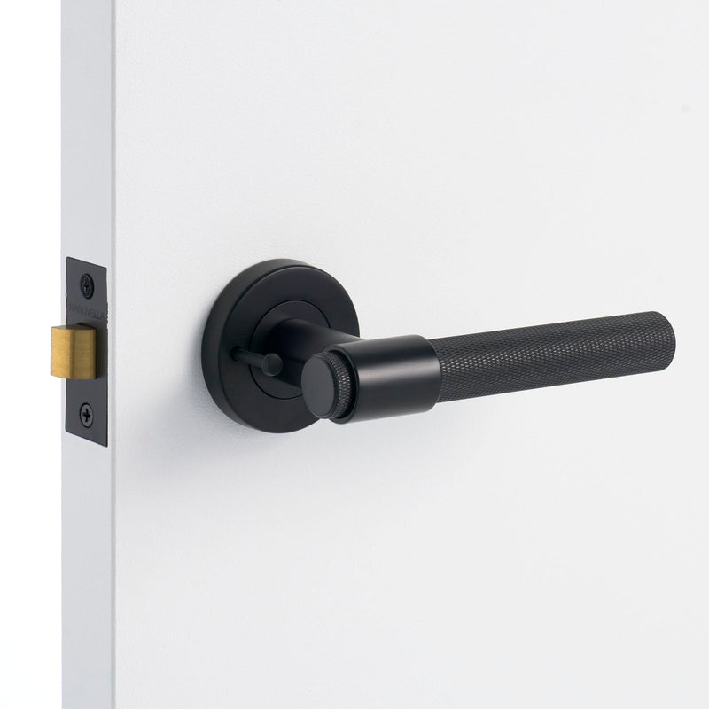 Matt Black Privacy Door Handle Installed on a Door