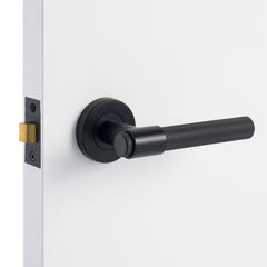 Matt Black Passage Door Handle Installed on a Door